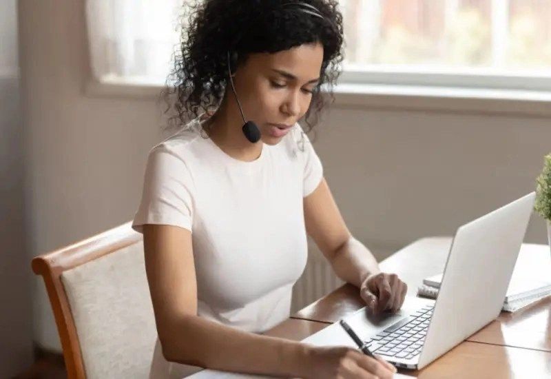 Concentrated African American Woman Call Center